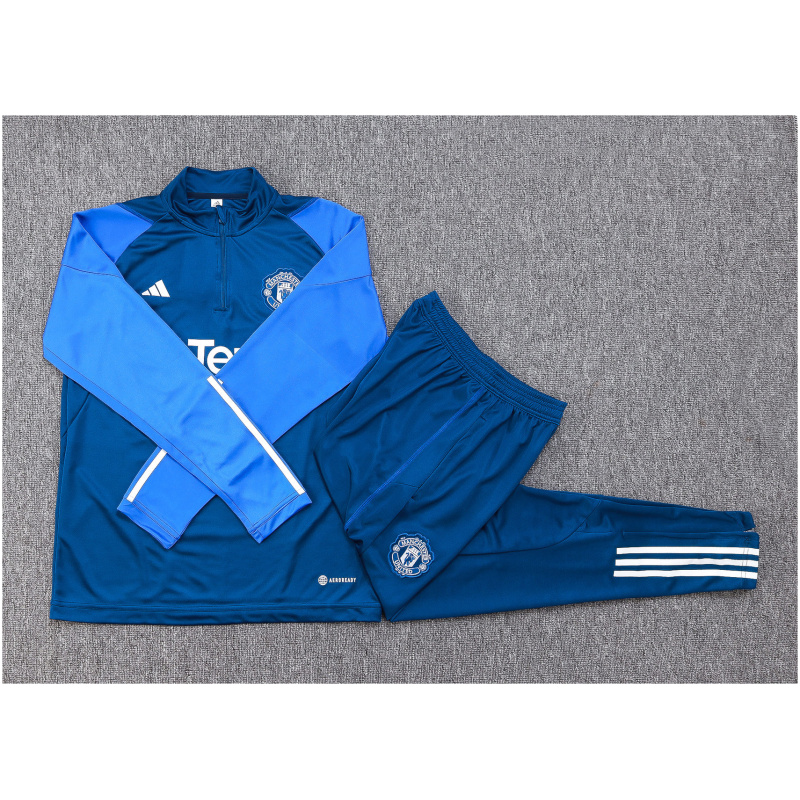 Ensemble d’entraînement pour enfants Manchester United bleu 2023/24