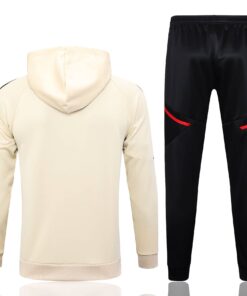 Survêtement d’entraînement Manchester United : Veste à capuche et pantalon crème 2023/24