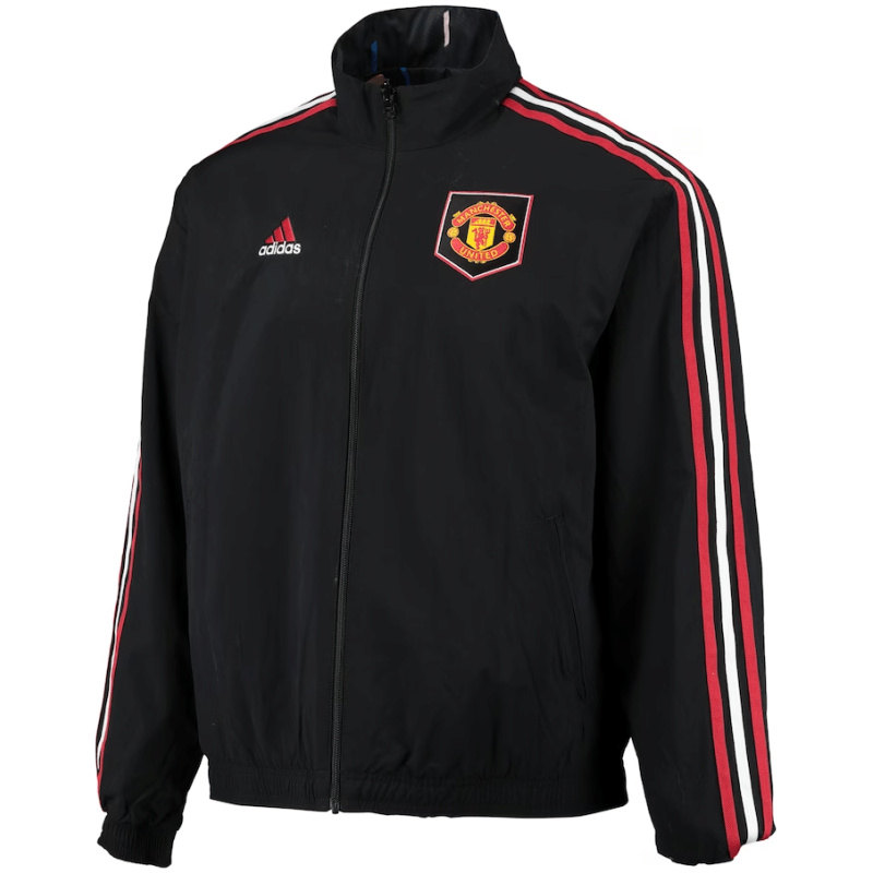 Veste Windrunner réversible à fermeture éclair complète avec logo de l’équipe sur le terrain et hymne de Manchester United 2023/24
