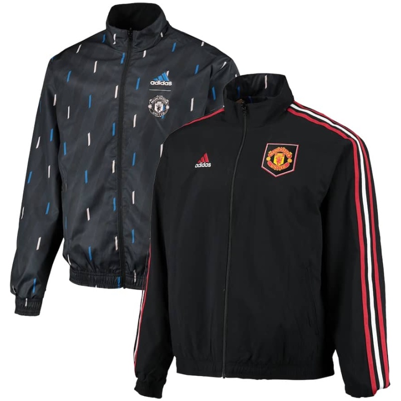 Veste Windrunner réversible à fermeture éclair complète avec logo de l’équipe sur le terrain et hymne de Manchester United 2023/24