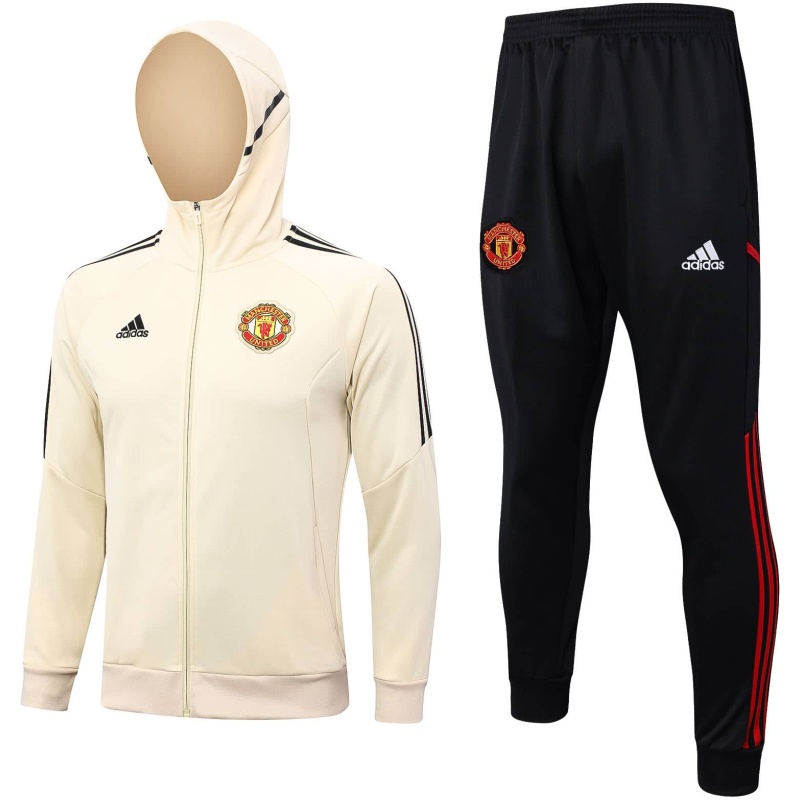 Survêtement d’entraînement Manchester United : Veste à capuche et pantalon crème 2023/24