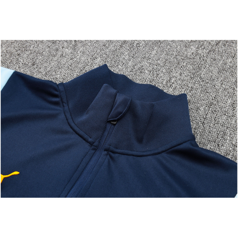 Veste et pantalon d’entraînement Manchester City Royal 2023/24