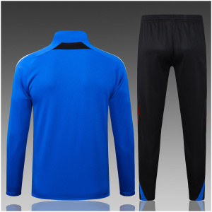 Veste et pantalon d’entraînement pour enfants Manchester United Bleu 2025/26 maillots bon marché
